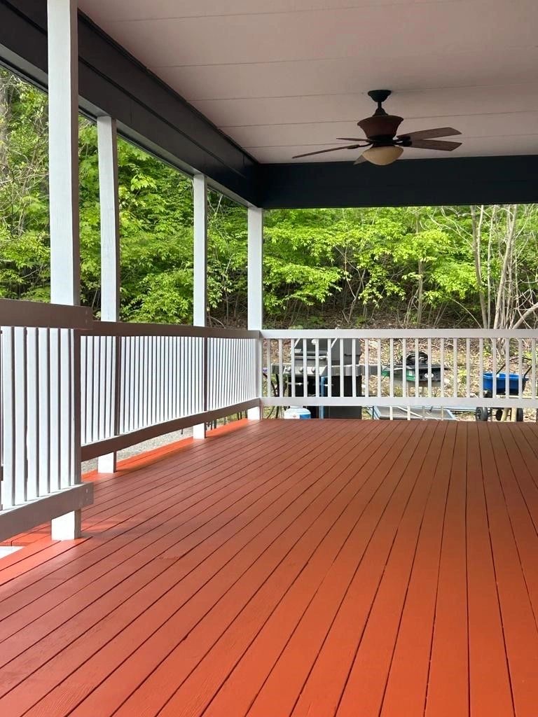 Painted porch with white railings