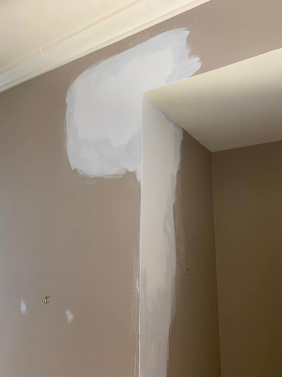 Wall and corner patched and sanded before painting